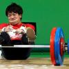 Йосуке Накаяма из Японии   после неудачного подъема в соревнованиях потяжелой атлетике. Yves Herman / Reuters