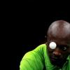 Сегун Ториола из Нигерии   в мужском одиночном разряде против Коки Нивой из Японии. Mike Ehrmann / Getty Images