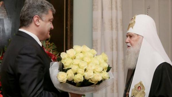 Фото:    Петро Порошенко та патріарх Філарет — одні з найголовніших дійових осіб