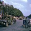 Американские армейские грузовики на Елисейских полях на следующий день после освобождения Парижа. Август 1944.