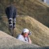 Женщина отдыхает после сбора урожая пшеницы. (Драчев Виктор)