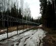 Фото:  Тот самый забор вдоль границы Латвии и России