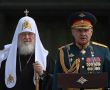 Патриарх Московский Кирилл и министр обороны России Сергей Шойгу в главном храме