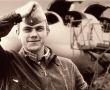  На колажі зображений підполковник у відставці, льотчик — Віктор Савченко на фон