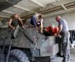 Фото:  Как пенсионеры-волонтеры ремонтирует боевые машины