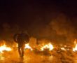 Фото:  Столкновения между протестующими и силовиками на улице Грушевского  