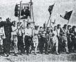 Рабочие шли на демонстрацию под красными флагами и с портретами Ленина. 1962 г.